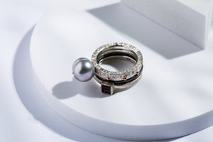 Set of four silver gold rings with pearl & garnet stone