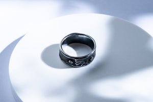 Unisex blackened silver ring with onyx and topaz stones