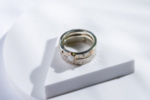 Set of two silver gold rings with opal stone