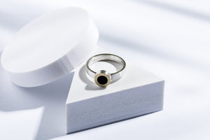 Silver ring with gold and ebony details