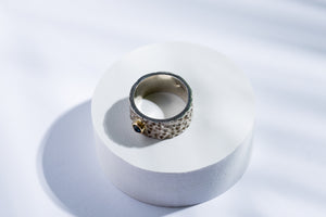 Silver ring with gold details & blue sapphire