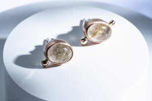 Silver and pink gold earring with rutile quartz