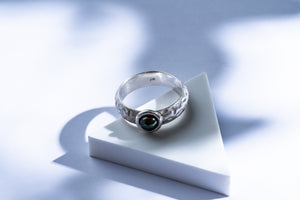 Silver ring with green river pearl